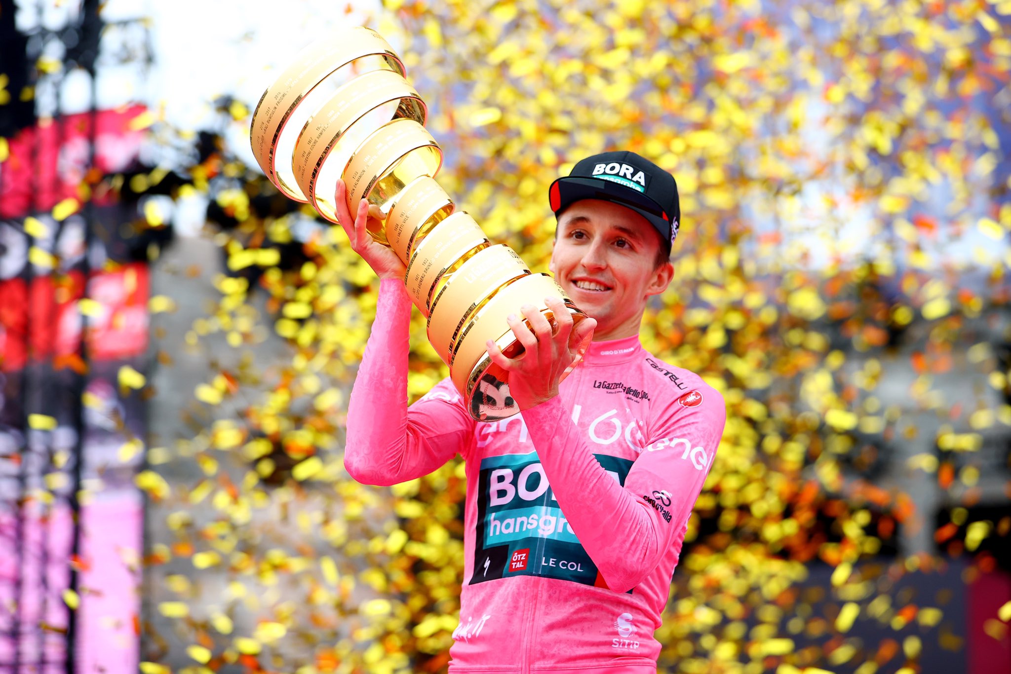 Jai Hindley of Western Australia with the 2022 Giro d'Italia trophy and pink jersey